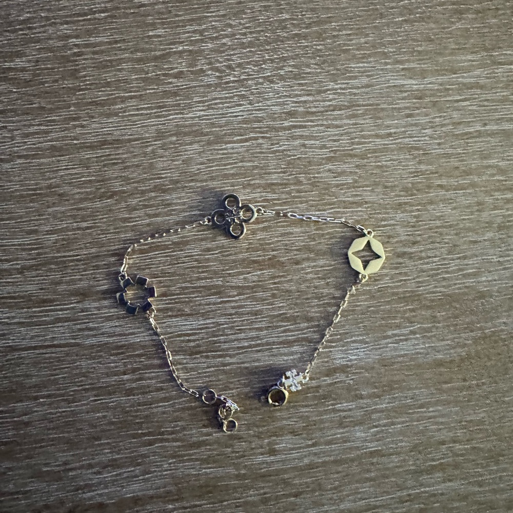 Delicate Gold Charm Bracelet with Star and Flower
